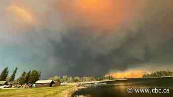 Massive out-of-control wildfire near Flin Flon and Manitoba-Sask. border forces evacuations