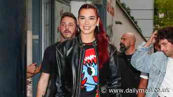Dua Lipa looks edgy in a biker jacket and blue denim jeans as she arrives in Paris to promote her latest album Radical Optimism