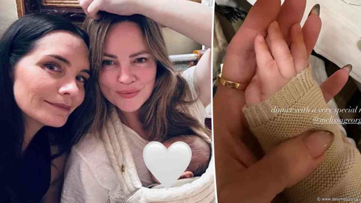 Melissa George celebrates her first Mother's Day with newborn son at a restaurant in France after welcoming her third child at age 47
