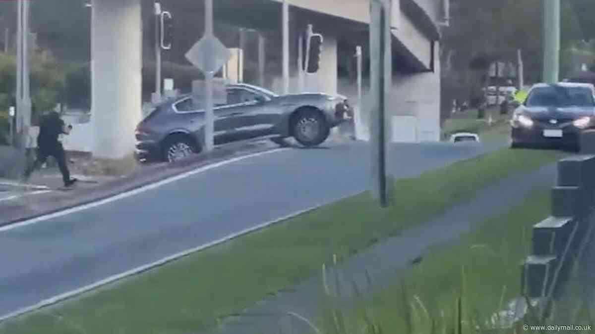 Dramatic moment four teenagers are arrested after allegedly stealing luxury cars and leading cops on wild chase on the Gold Coast