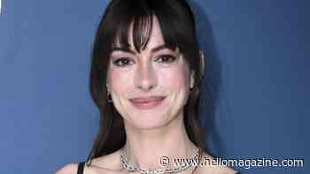 Anne Hathaway is almost unrecognizable with blonde hair and a sheer gown in throwback snap
