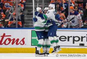 Boeser scores twice, Vancouver Canucks hold off Oilers for 4-3 win in Game 3