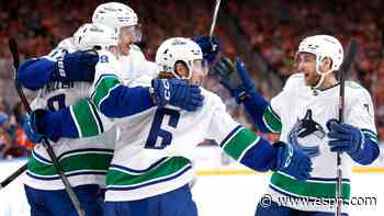Canucks hold off Oilers for 2-1 lead in series