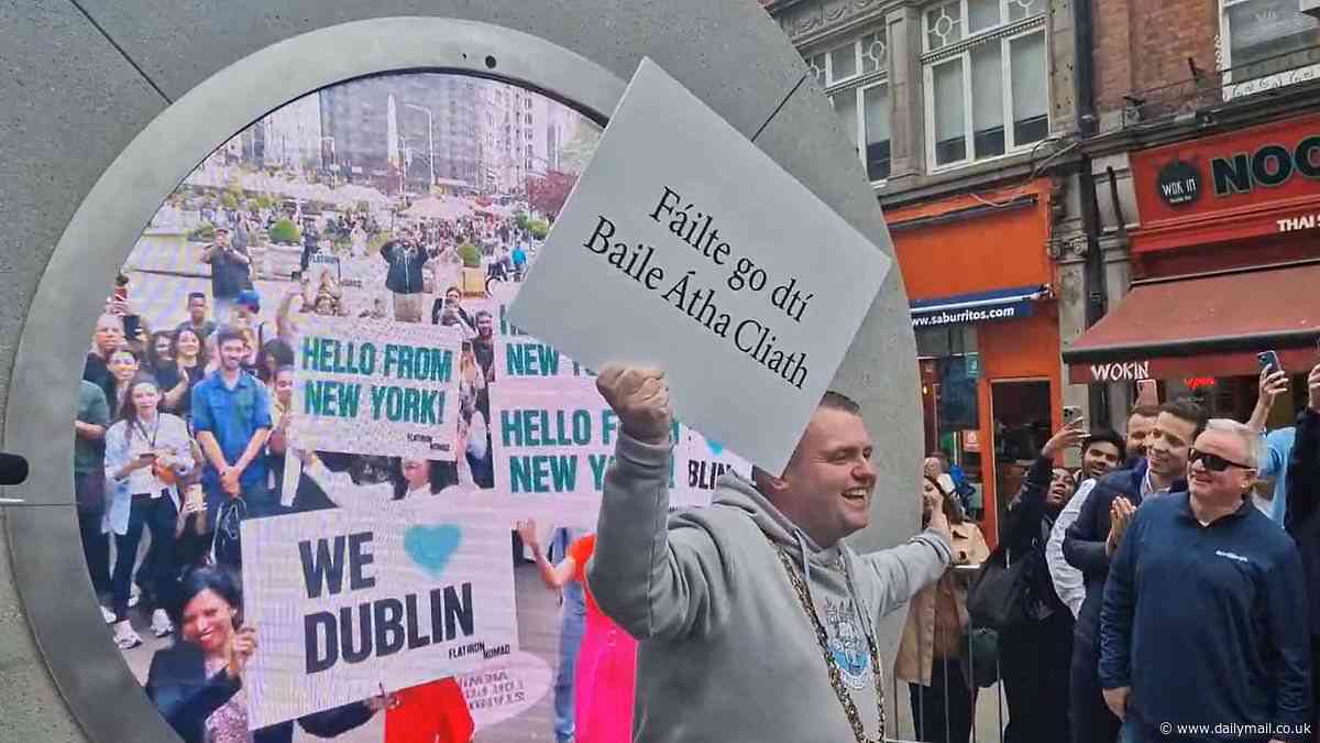 Portal connecting New York to Dublin visitors use the futuristic sculpture for offensive jibes