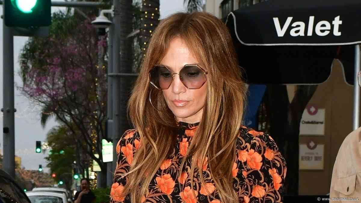 Jennifer Lopez dons floral frock for Mother's Day meal in Beverly Hills... after showing off the bouquets, presents, and cake she was gifted