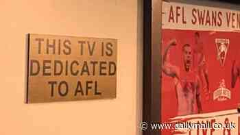 Why a simple plaque next to a TV in a pub has left Aussie footy fans furious
