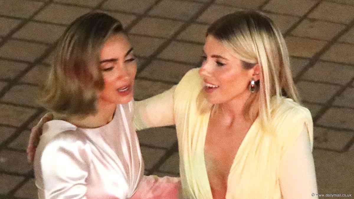 The Saturdays' Frankie Bridge and Mollie King hug goodbye as they leave the boozy BAFTA TV afterparty after sweet reunion