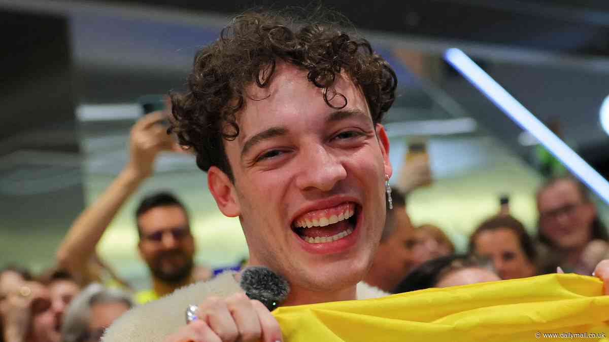 Eurovision winner Nemo receives a hero's welcome as they arrive home in Switzerland after hitting out at contest for 'unbelievable double standard' and suggesting it 'needs fixing'