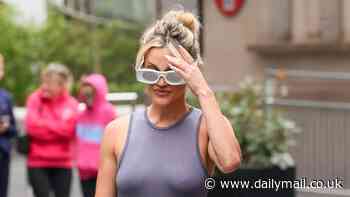 Sore head, Ashley? Heart FM host covers her eyes with shades as she arrives at work following boozy night at the BAFTA TV Awards