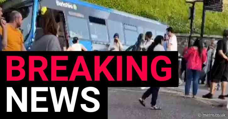 Bus left tilting against car after crash outside Windsor Castle’s walls