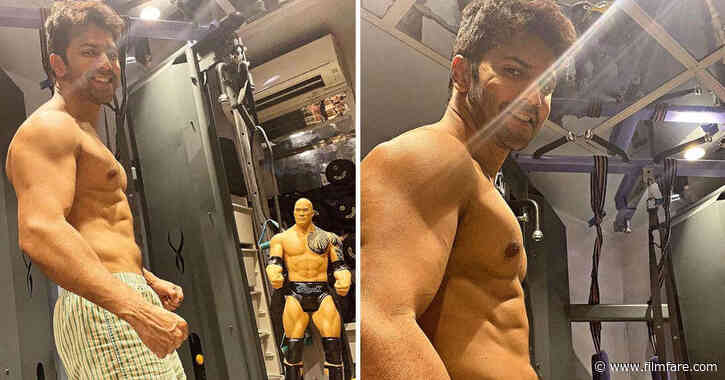 Varun Dhawan poses with a Rock doll during his workout See Inside