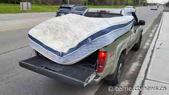 Police pull over pickup truck for 'mattress monstrosity'