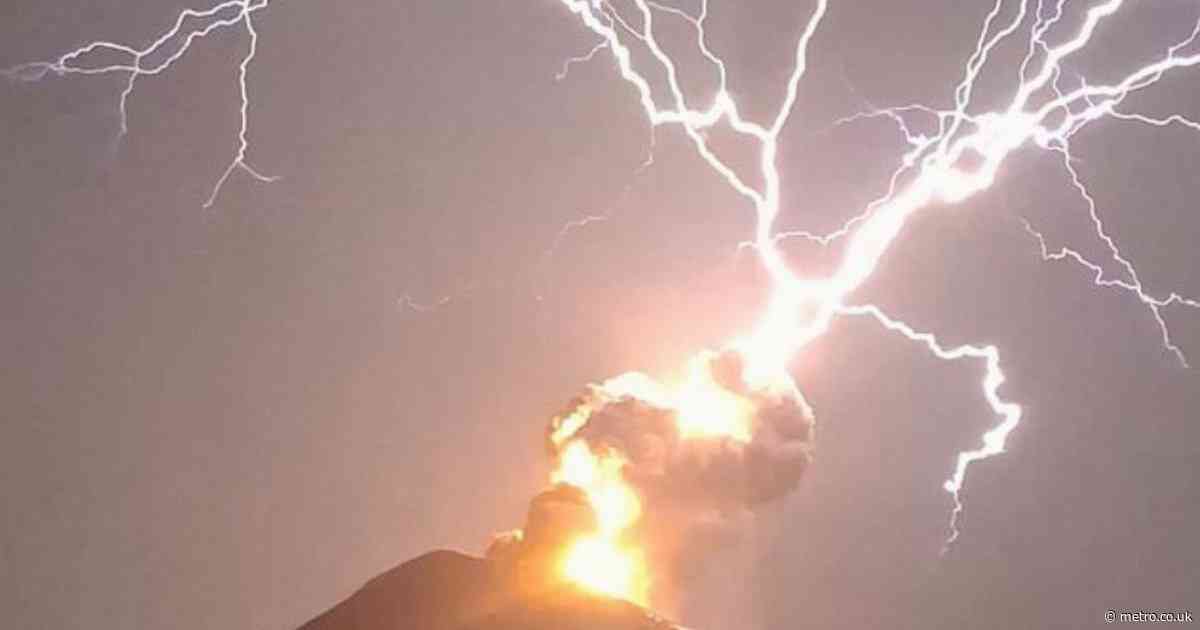Out-of-this-world moment lightning bolt strikes volcano while it’s erupting