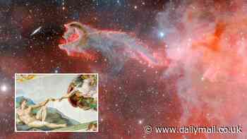 'Hand of God' reaches out for the stars in breathtaking telescope image that bears resemblance to famous painting in Sistine Chapel