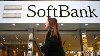 Japan's SoftBank Group trims investment losses but remains in red for fiscal year