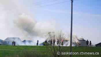 A crowd gathered along Highway 11 to watch this Saskatoon house fire