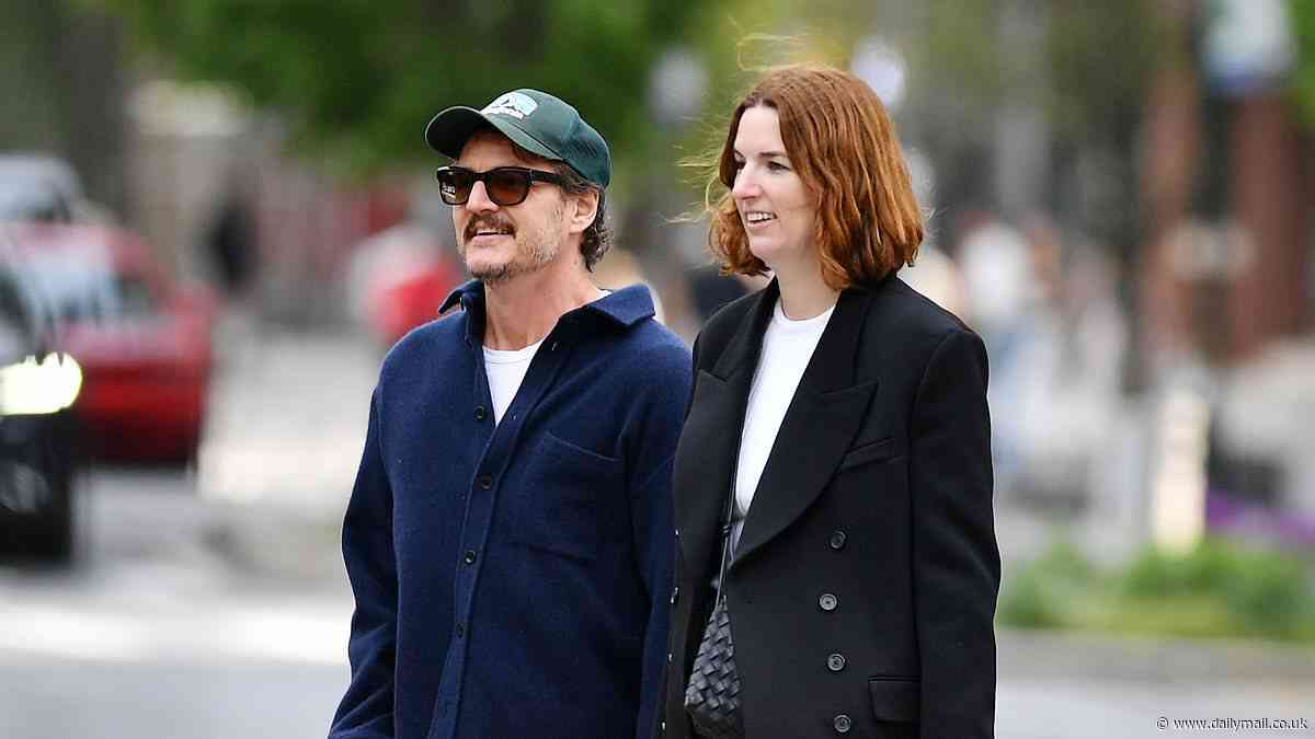 Pedro Pascal's agent Sue Carls puts her hands on his shoulders before he takes photos of her during coffee run in New York City