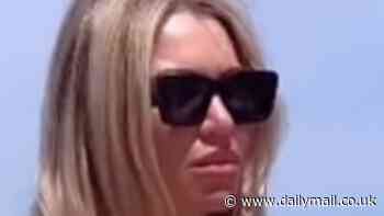 Christine McGuinness displays her incredible curves as she models skimpy swimwear while unwinding on Ibiza beach break