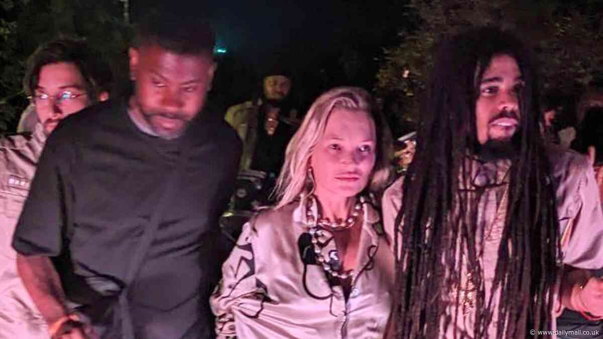 RICHARD EDEN: In harmony! Supermodel Kate Moss, 50, is pictured holding hands with Bob Marley's reggae star grandson Skip, 27, who is almost half her age