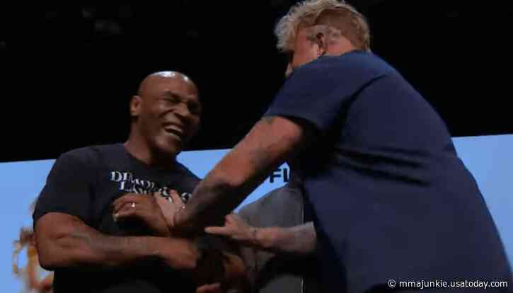 Video: Mike Tyson, Jake Paul have playful faceoff at first press conference in New York