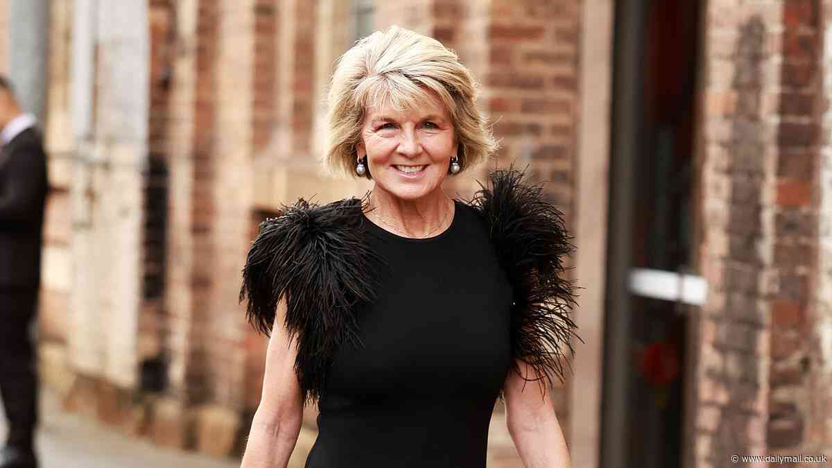 Julie Bishop is slammed by PETA after wearing a feathered dress at Australian Fashion Week: 'It is every bit as cruel as fur'