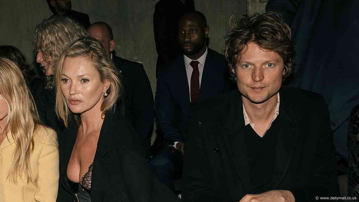 Is this love? Kate Moss and Nikolai von Bismarck share some frosty front row chemistry while making their first joint appearance in months at Gucci Cruise show -  after supermodel was pictured hand-in-hand with Bob Marley's 27-year old grandson