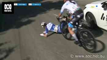 'A car can be a weapon': The horrifying moment car crashes into leaders of cycling race