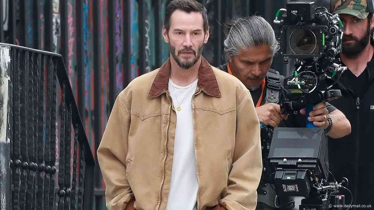 Keanu Reeves looks focused as he films scenes for director Jonah Hill's dark comedy Outcome in downtown Los Angeles