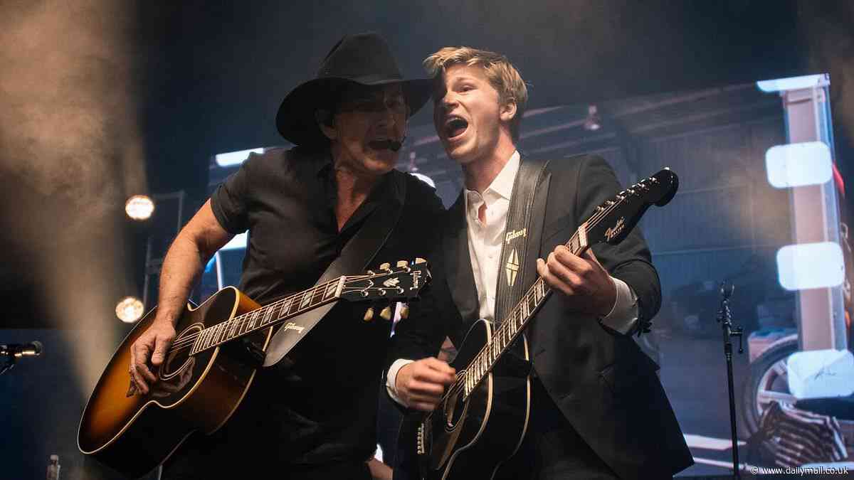 What can't he do? Robert Irwin unleashes his inner country music star as he performs with Lee Kernaghan on stage in Las Vegas