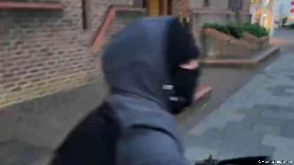 Moment 'influencer' nearly has his phone 'snatched' as masked 'thief' whizzes past on his bike while livestreaming on social media and 'filming the incident with his smart glasses'