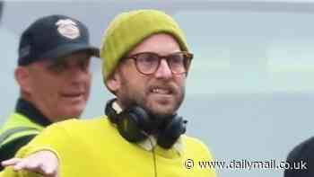 Jonah Hill shows off his svelte frame while on set as he steps behind the camera to direct Keanu Reeves in Outcome