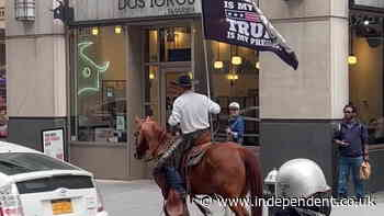 Trump supporter rides horse through New York City as criminal trial continues