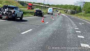 Aanhanger verliest kozijn op A58, snelweg bezaaid met glasscherven