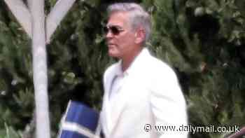 George Clooney, 63, looks suave in a white suit and sunglasses as he's seen on set in Italy filming new Netflix movie Jay Kelly