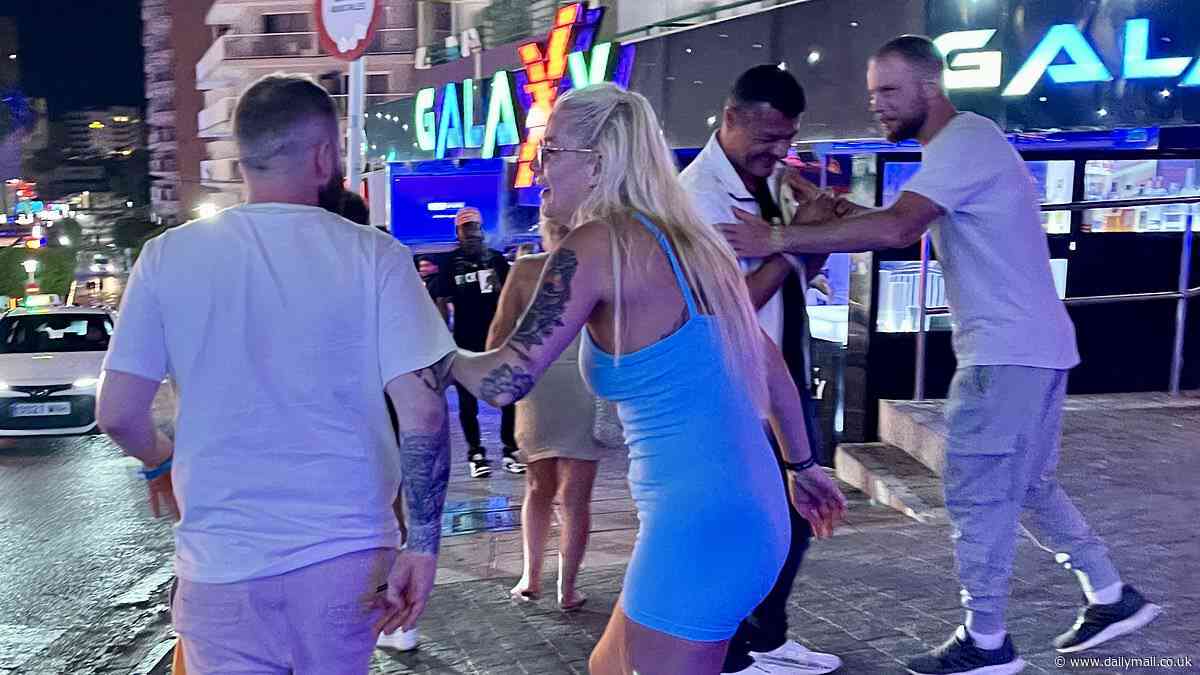 Inside the 'slum-like' Magaluf strips where families fear to tread: How aggressive reps selling cheap drinks try to drag mothers pushing prams into bars to do SHOTS… as mayor calls for 9.30pm drinking curfew