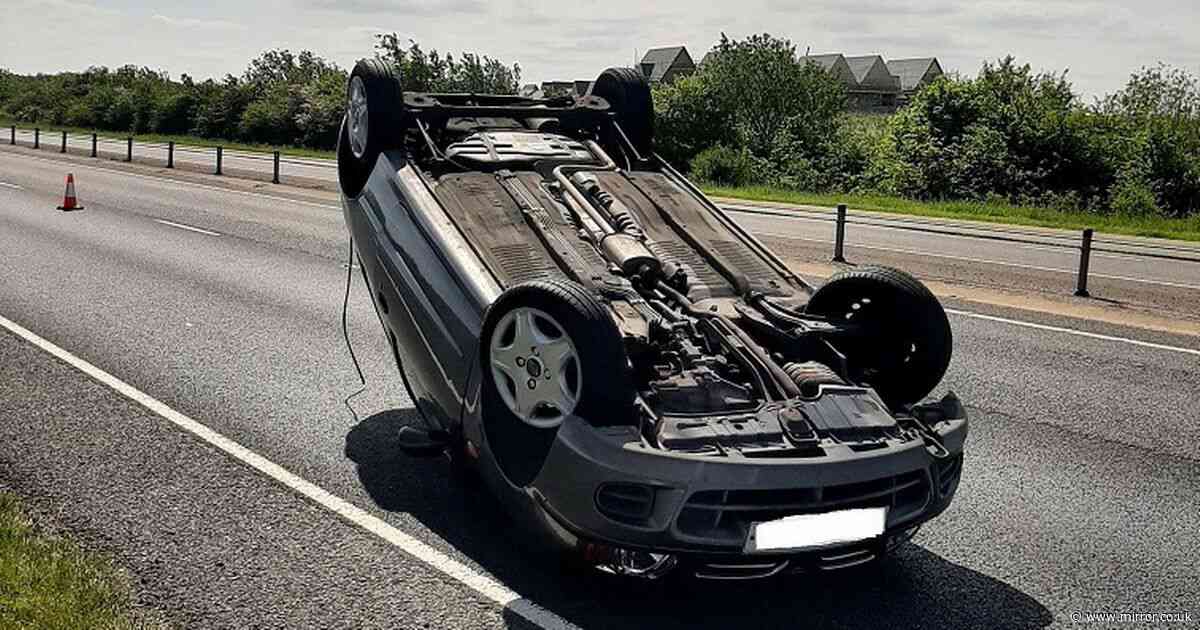 Driver 'frightened by spider' flips car onto its roof on busy dual-carriageway