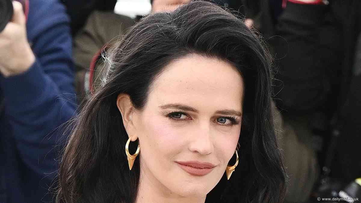 Eva Green shows off her hourglass figure in a black off-the-shoulder shirt and a stylish skirt as she joins her fellow jurors at Cannes Film Festival