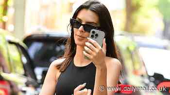 Emily Ratajkowski shows off willowy physique in casual workout gear walking dog Colombo... after THAT head-turning Met Gala look