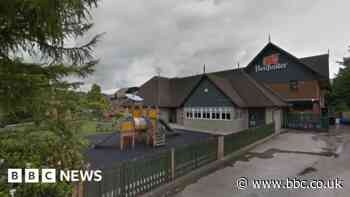 Armed group injure two men in pub garden attack