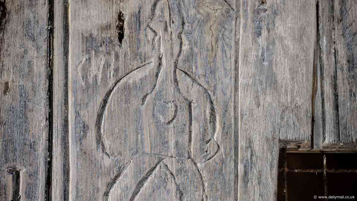 Chilling hanging scenes and sailing ship scrawled by troops amid threat of French invasion are found on 1790s door at Dover Castle