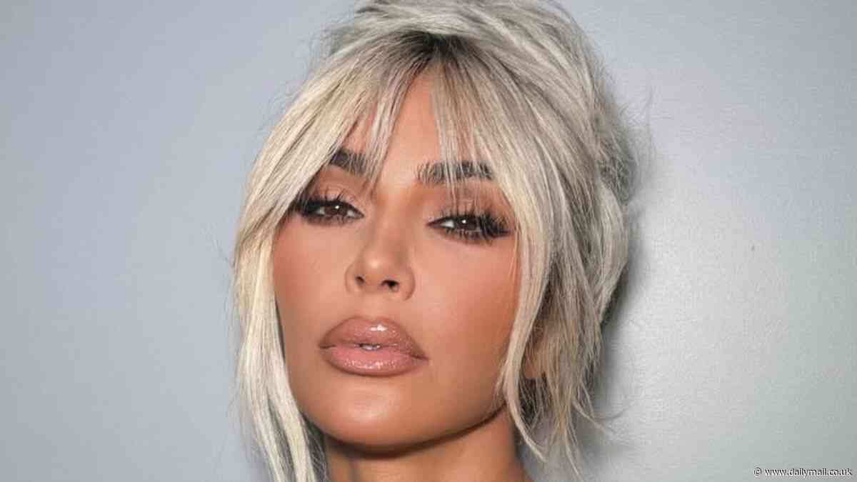 Kim Kardashian channels 90s Pamela Anderson as she rocks messy blonde bouffant and sexy LBD in new glamour shots