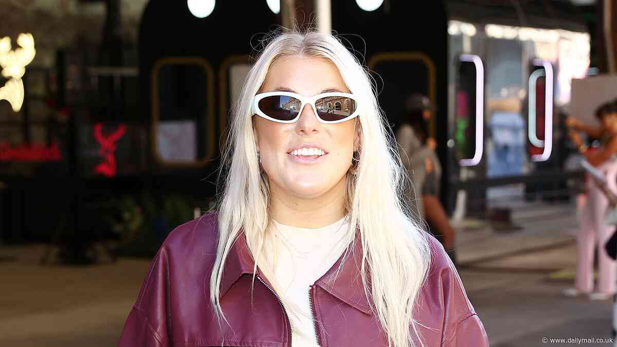 Shane Warne's daughter Brooke sweetly channels the late cricketer as she steps out in shades for day two of Australian Fashion Week