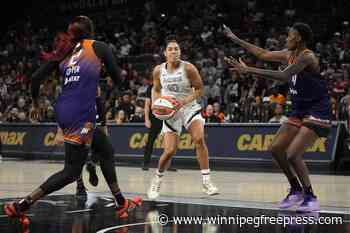 Wilson’s double-double leads 2-time champion Aces past Mercury 89-80 in season opener