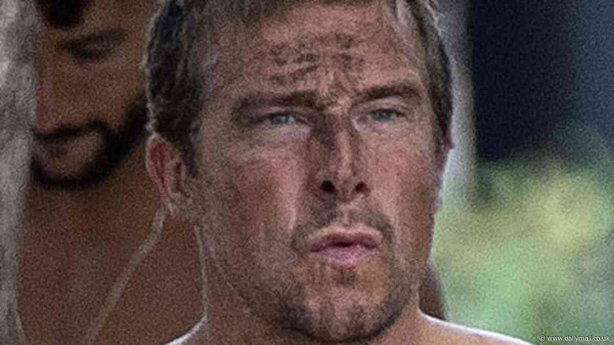 Shirtless Bear Grylls emerges from his luxury Costa Rica hotel with mud on his face as filming gets underway for his new Netflix show