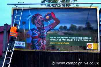 Activists 'hack' billboards to protest against Shell advertising