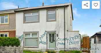 An estate agent has removed a house listed for sale covered in 'Pedos' graffiti
