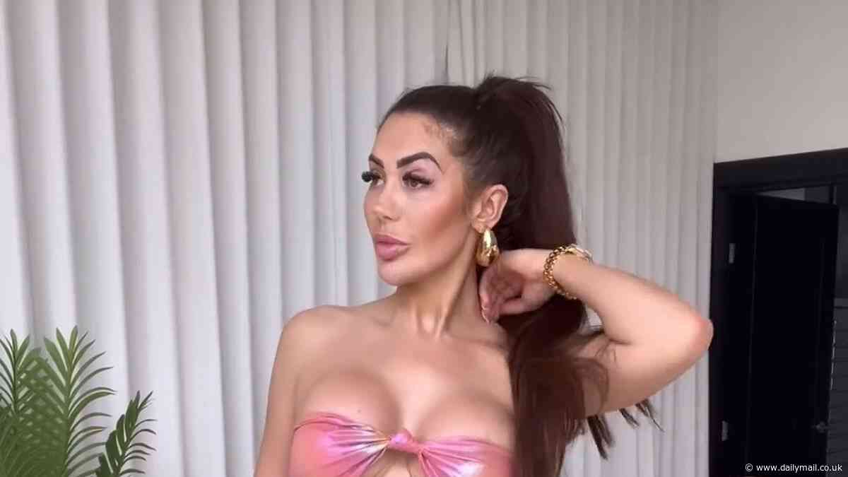 Chloe Ferry puts on a VERY raunchy display in tiny strapless bikini as she shows off her surgically enhanced body while packing for her holiday