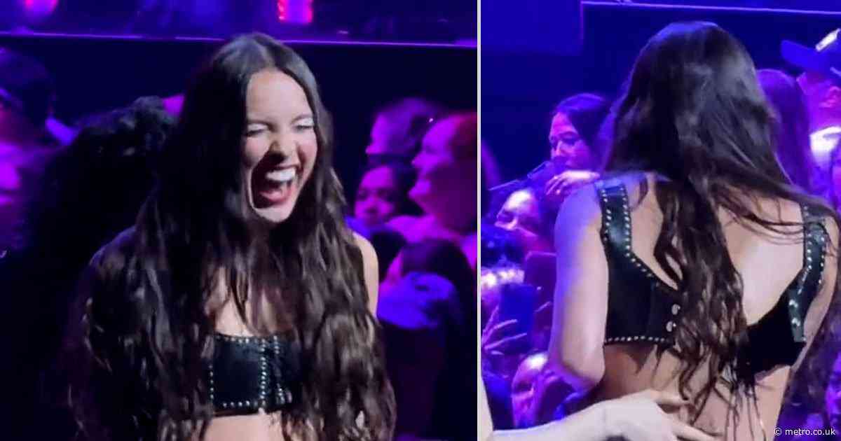Popstar’s bra top comes undone onstage as dancer rushes to help ‘panicked’ singer