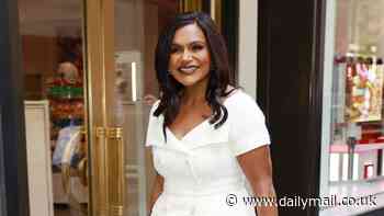 Mindy Kaling, 44, models a flirty white dress with boots in New York City… after posing in swimsuits for her new Andie collection