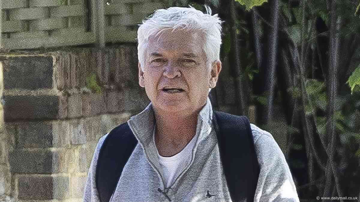 Phillip Schofield looks deep in thought as he's seen for the first time since breaking social media silence in over a year - after hinting TV comeback